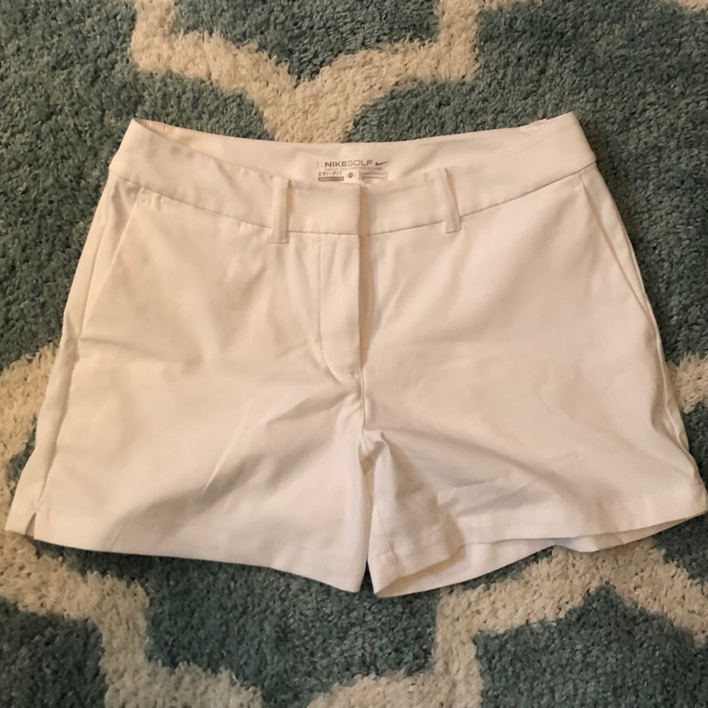 White Nike golf drifit shorts size 4